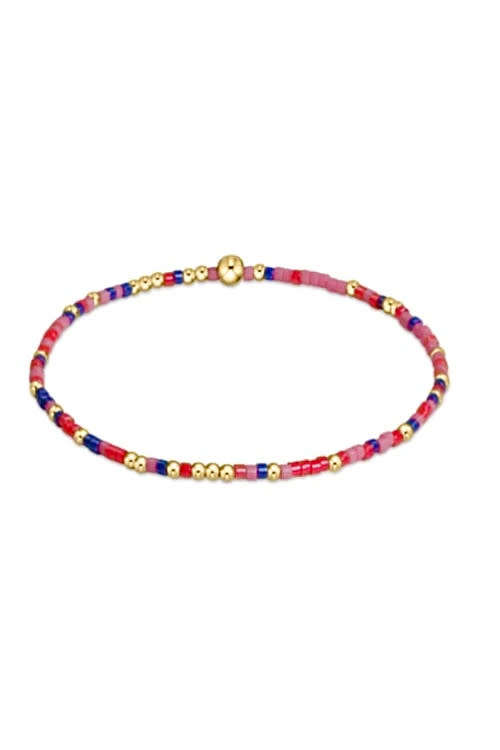 Hope Unwritten bracelet featuring mixed seed beads in various colors with gold-filled accents on elastic cord.