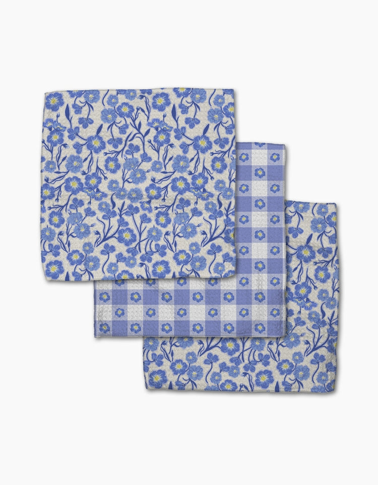 Set of three waffle weave dishcloths in recycled polyester with single-sided prints and hang loops.