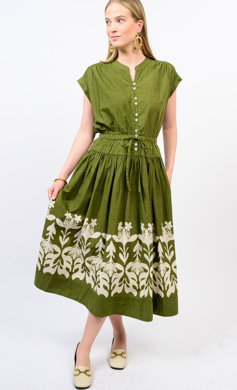 Olive green Alice Border Maxi Dress with a button-front bodice and floral border print.