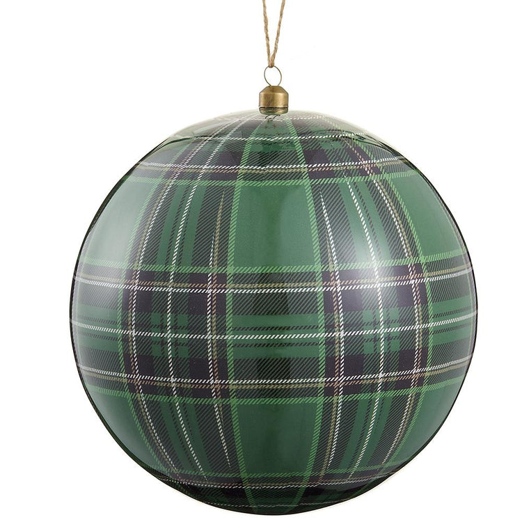 Green and navy plaid plastic ball ornament with a gold cap and hanging string.