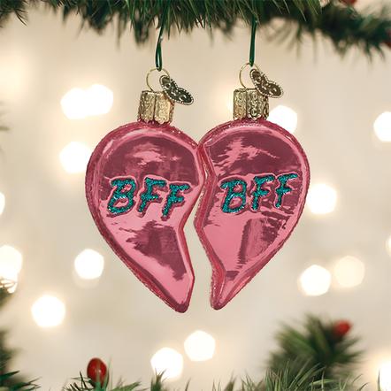 Heart-shaped Christmas ornament with a glossy red finish.
