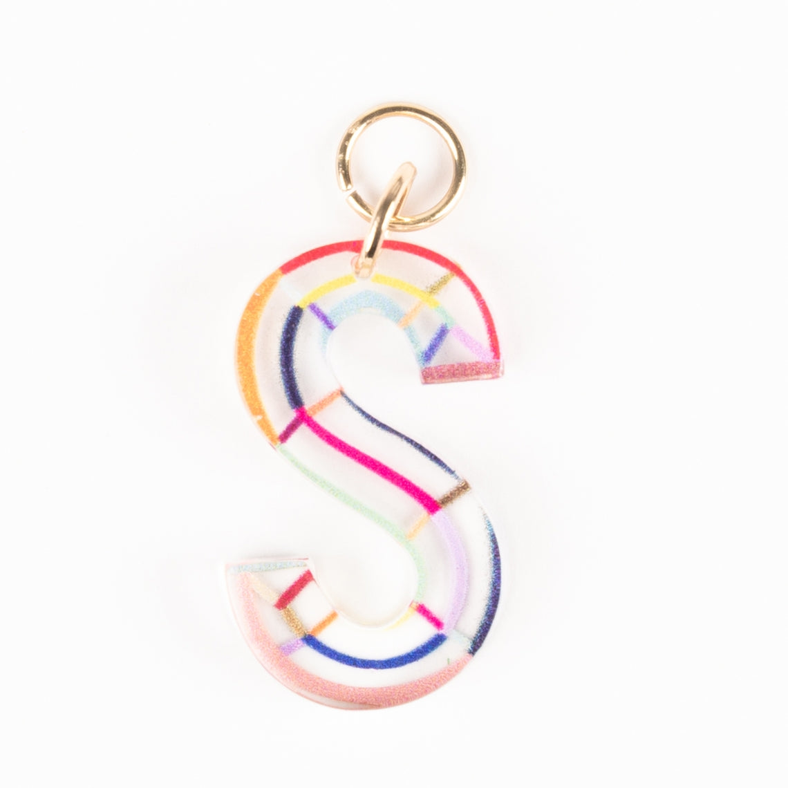 Clear acrylic letter S bag charm with colorful abstract stripes and an 18K gold-plated ring.