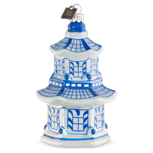 Blue and white glass pagoda Christmas ornament with tiered roofs and window patterns.