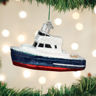 Glittery glass charter boat Christmas ornament with a white cabin, blue hull, and red bottom.