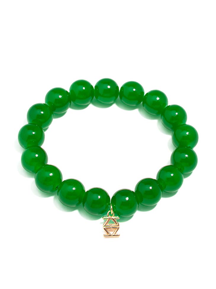Stretch bracelet with glossy lucite glass beads in a single-color pattern.