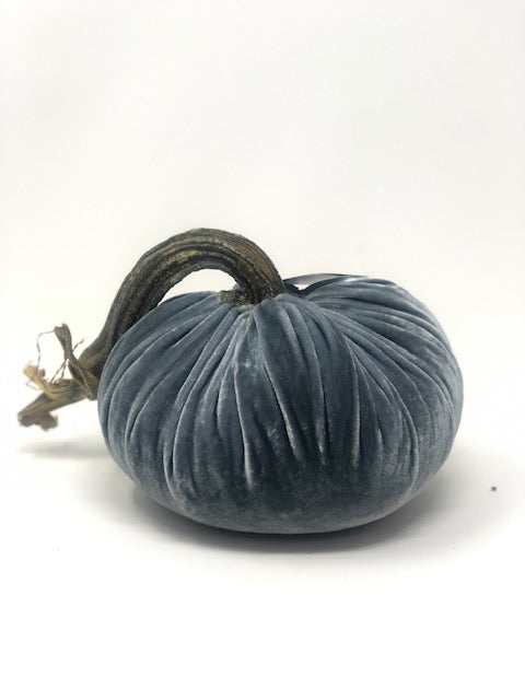 Handmade orange velvet pumpkin with a natural stem.