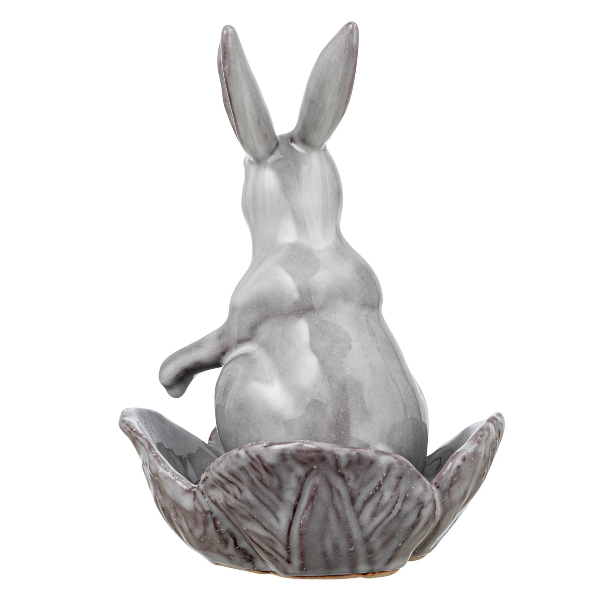 Stoneware rabbit figurine holding a flower-shaped bowl in neutral tones.