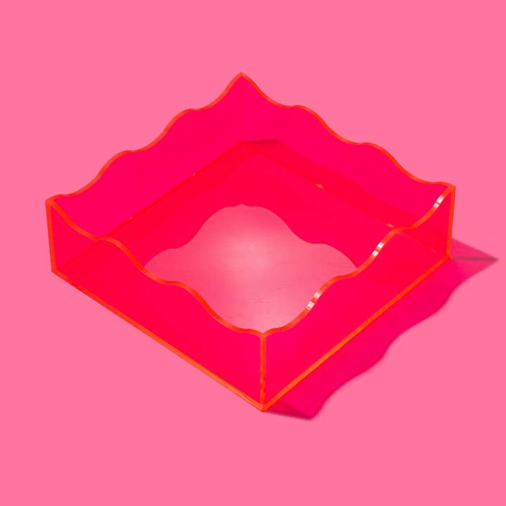 Square acrylic tray with wavy edge detail in clear material