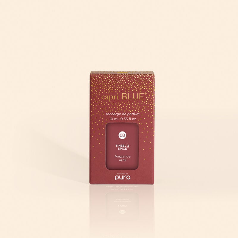 Tinsel & Spice Pura Diffuser Refill vial with neutral-colored liquid and minimalist label design.