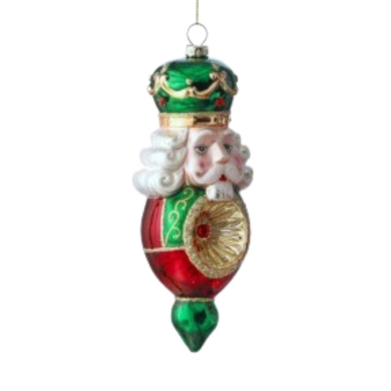 7-inch glass nutcracker soldier ornament with a green crown, red body, and gold reflector center.