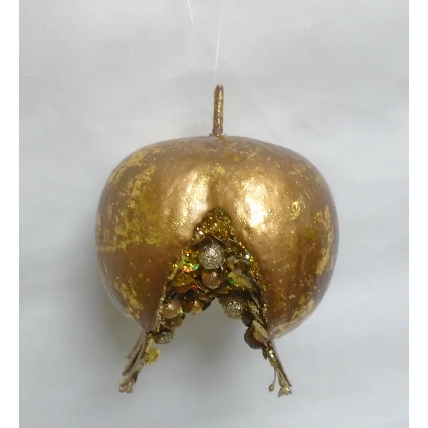 Medium Tuscan open pomegranate ornament with a textured metallic gold finish and beaded interior.