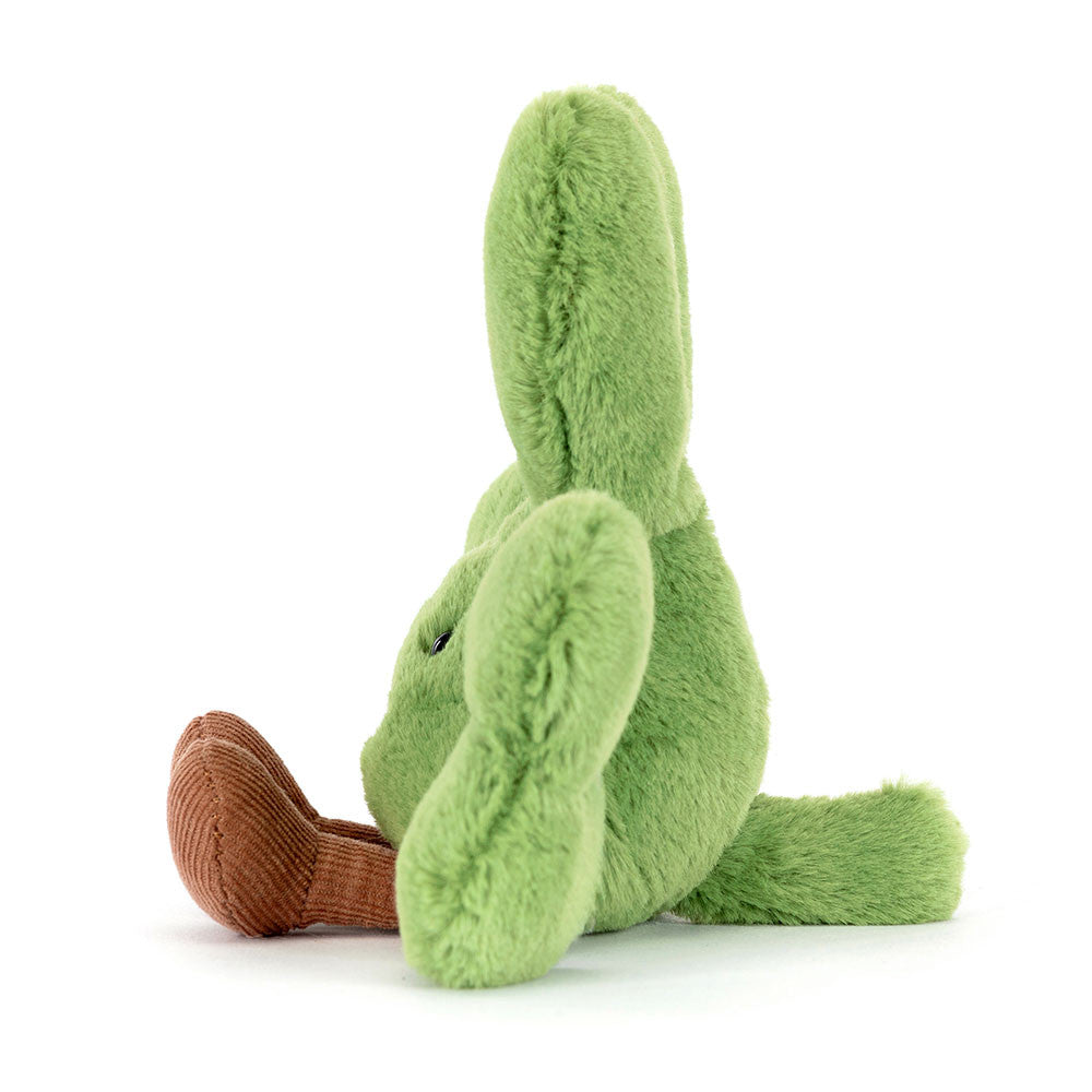 Side view of Amuseables Siofra Shamrock, a green plush shamrock with brown corduroy legs.