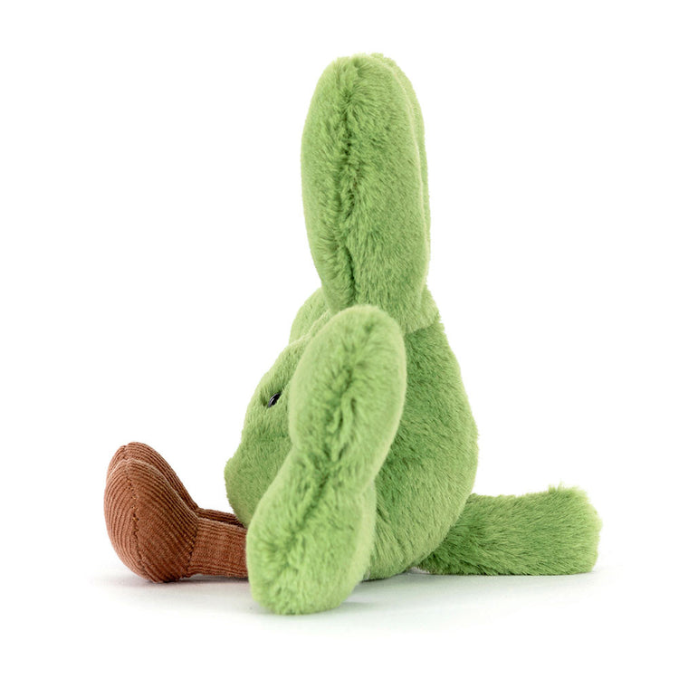 Side view of Amuseables Siofra Shamrock, a green plush shamrock with brown corduroy legs.