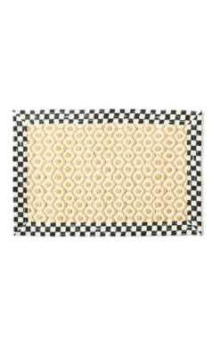 Courtly Check Natural Honeycomb 2' x 3' Jute Rug with black and white checkered border.