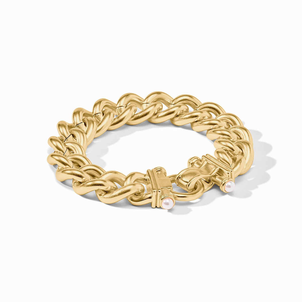 Gold-plated Dolce link chain bracelet with two glass pearl accents on a fold-over clasp.