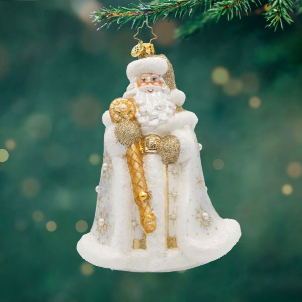 Gilded Kris Kringle glass ornament featuring Santa in a white and gold robe holding a staff.