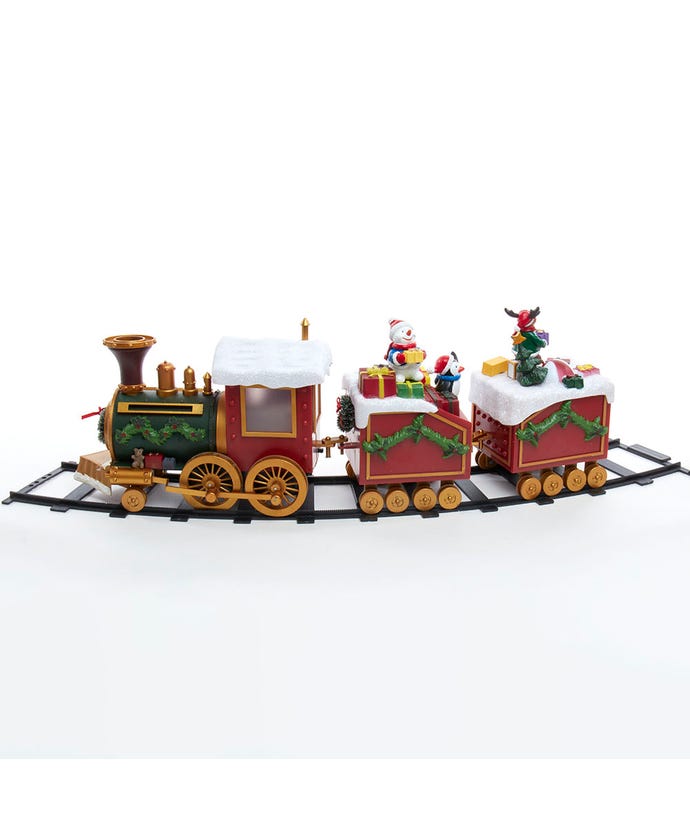 Multicolored battery-operated Santa train set with glowing lights playing Christmas music.