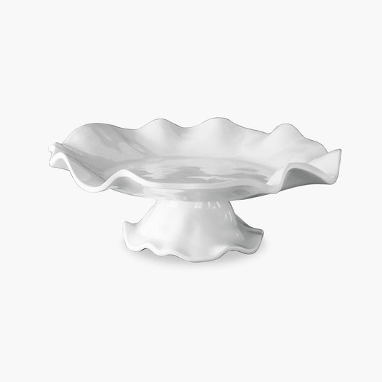 White pedestal cake plate with a raised center section