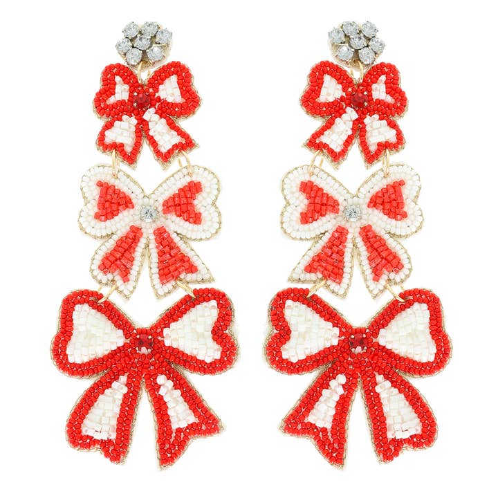 Striped bow ribbon beaded earrings in vibrant colors with a fun game day style.
