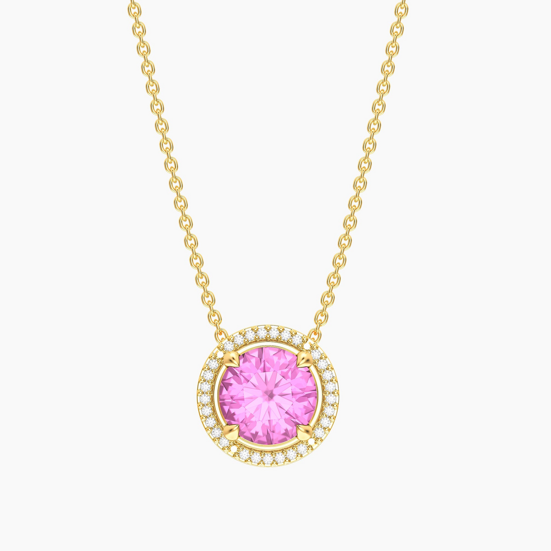 Gold plated birthstone pendant necklace with a round pink center stone and diamond halo.
