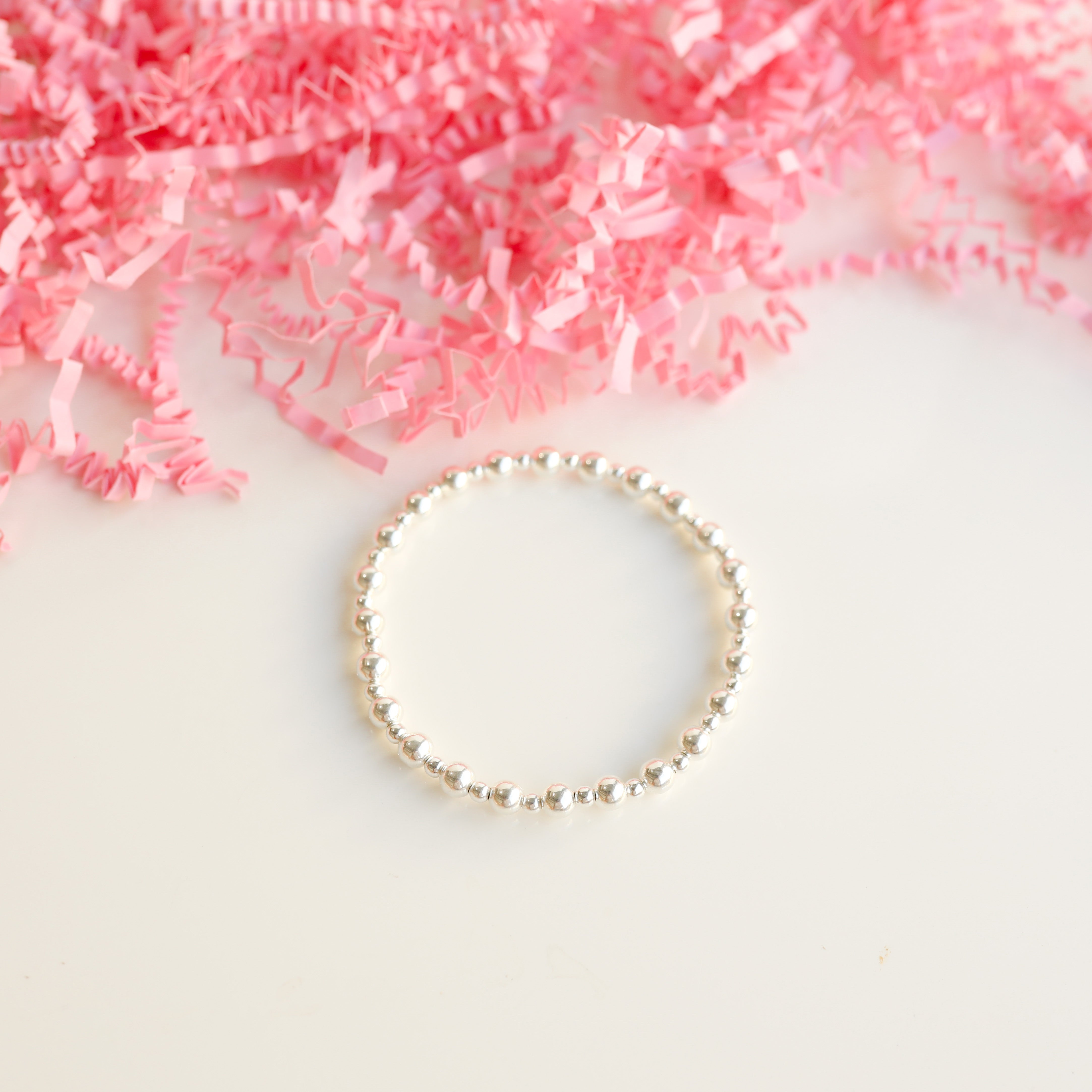 Sterling silver bead bracelet on durable elastic string