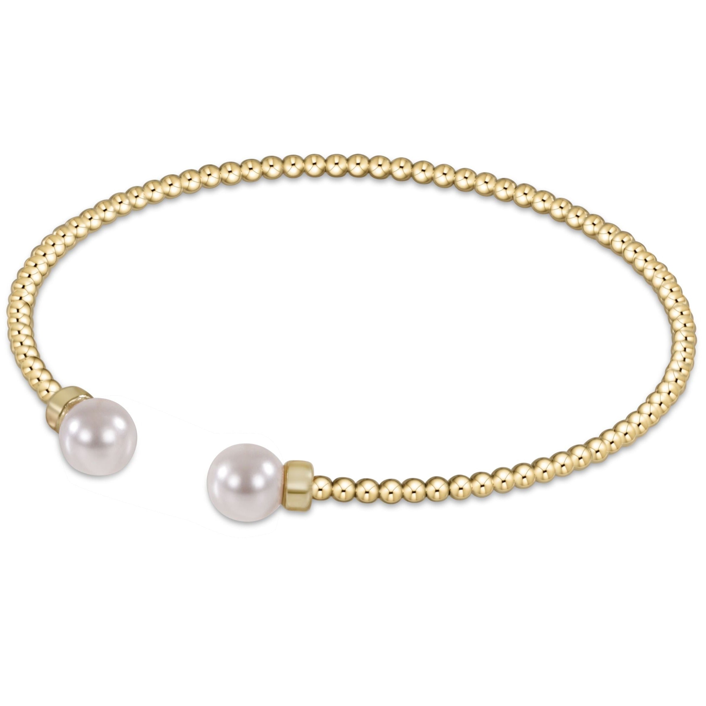 Classic gold 2mm bead cuff bracelet featuring two white pearls at the open ends.