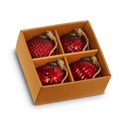 Three-inch red glass ball ornament with a smooth spherical shape.