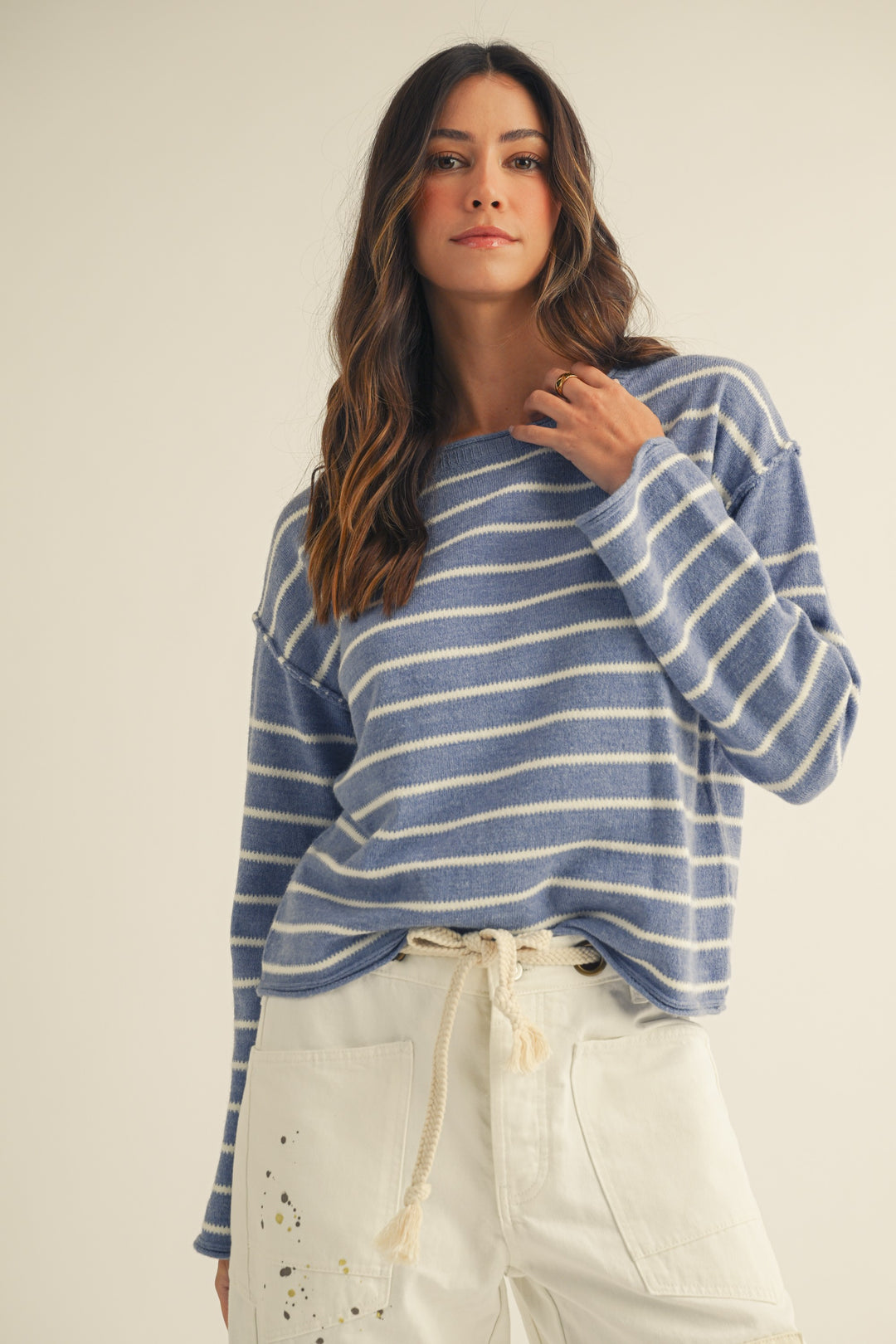 Relaxed fit pullover sweater in soft stripes with loose silhouette.