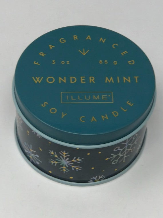 Wonder Mint soy candle in a small silver tin with white wax.