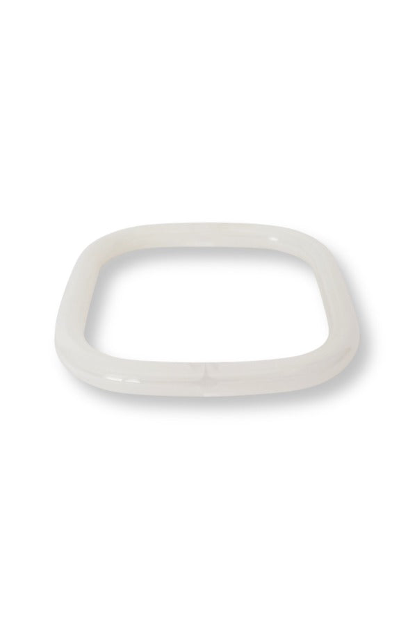 WS Aria Bangle, a thin, square-shaped white resin bracelet on a plain background.