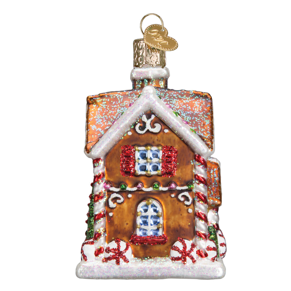 Glass gingerbread cottage ornament with glittery snow, candy cane pillars, and red shutters.