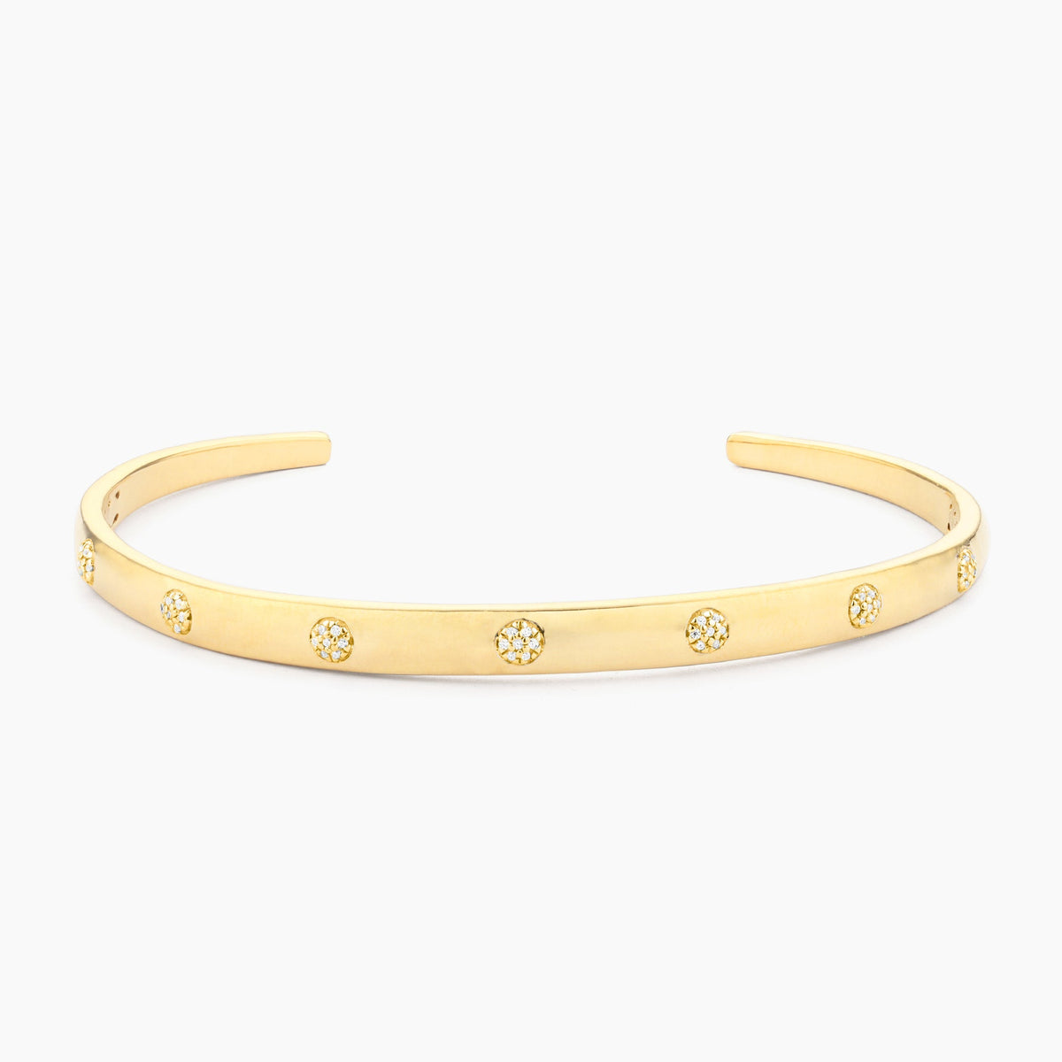 Gold plated Waterproof Lucky 7 Cuff Bracelet with seven circular diamond-set accents.