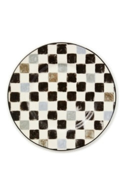 Round dinner plate with a hand-painted black and white checkered pattern and a black rim.