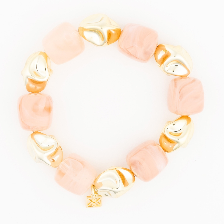 Lyla Bracelet featuring alternating chunky peach marbled resin and polished gold-tone metal beads.