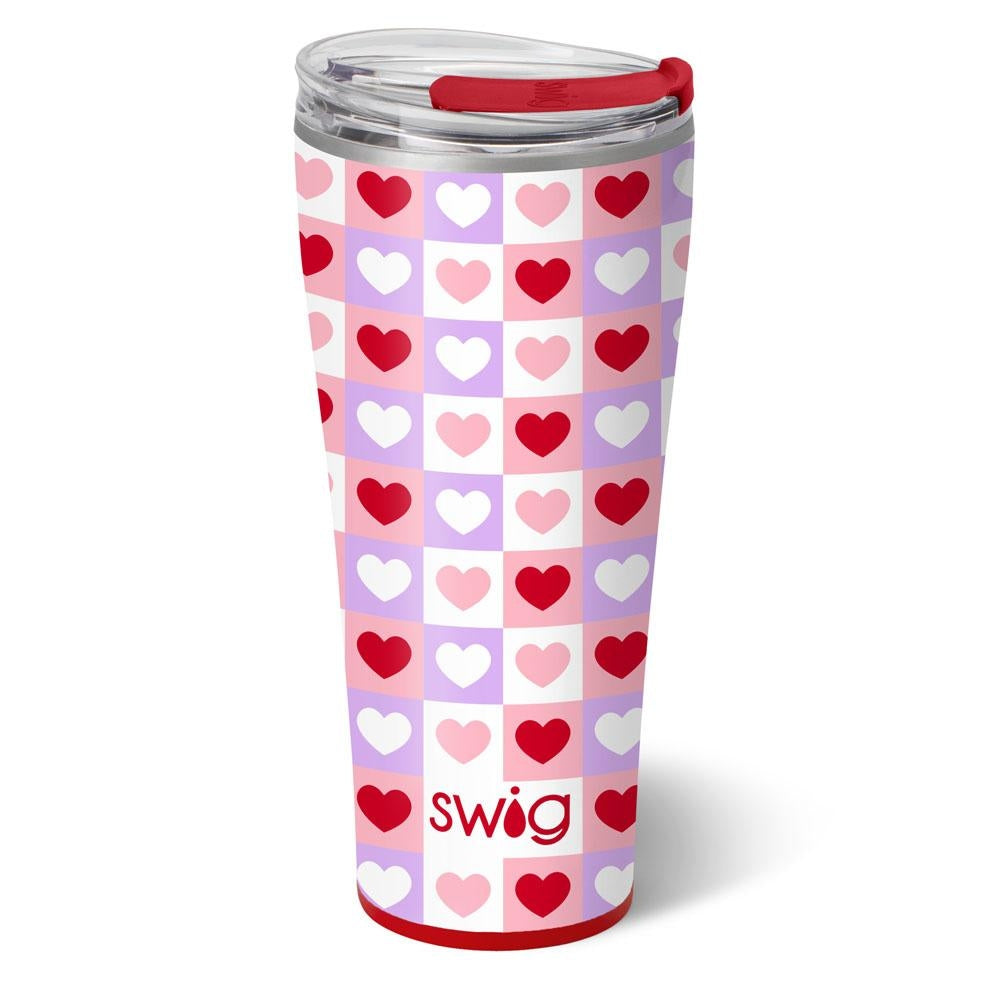 32oz stainless steel tumbler with a red and pink heart checkerboard pattern and a red lid.
