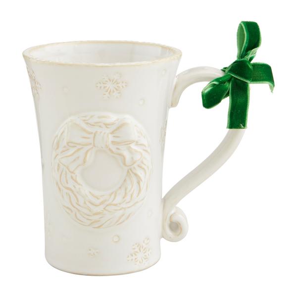 White Christmas stoneware mug with milk glaze, raised motif texture, antique wash finish.