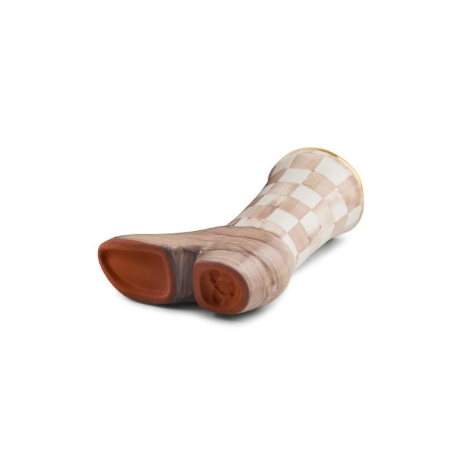 Bottom view of a mocha check cowboy boot bud vase showing the terracotta base and artisan stamps.