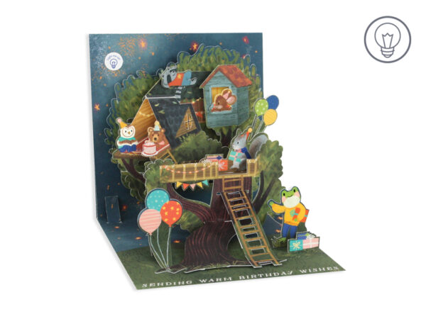 White envelope with gold holographic foil text reading 'sending warm birthday wishes' on a Treehouse Card.