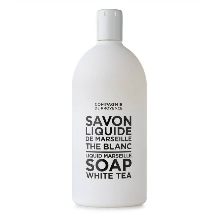 Refill bottle of Compagnie de Provence White Tea Liquid Marseille Soap, 33.8 fl oz.