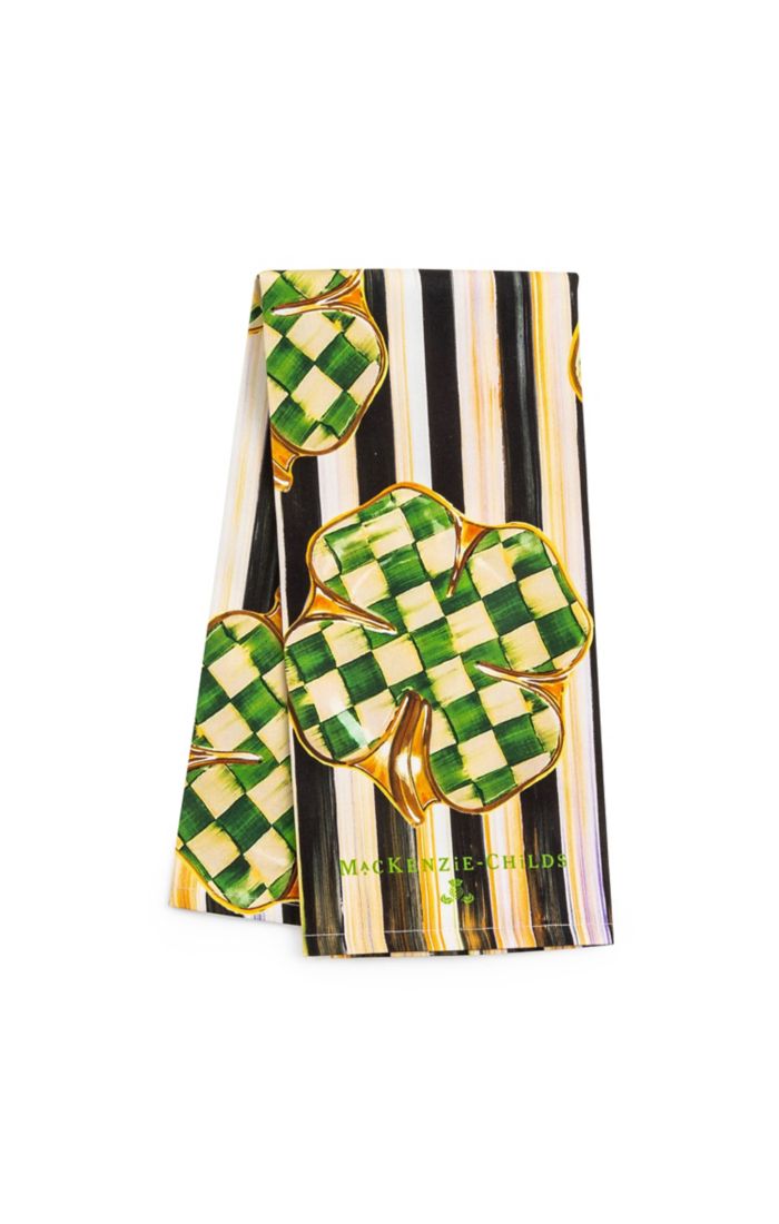 Dancing Clovers dish towel made of cotton featuring a green clover pattern on white fabric.