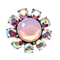 Silver stretch ring with large pink opal center surrounded by smaller iridescent rhinestones in a floral pattern.