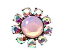 Silver metal flower ring featuring a large round pink opal center surrounded by iridescent crystals