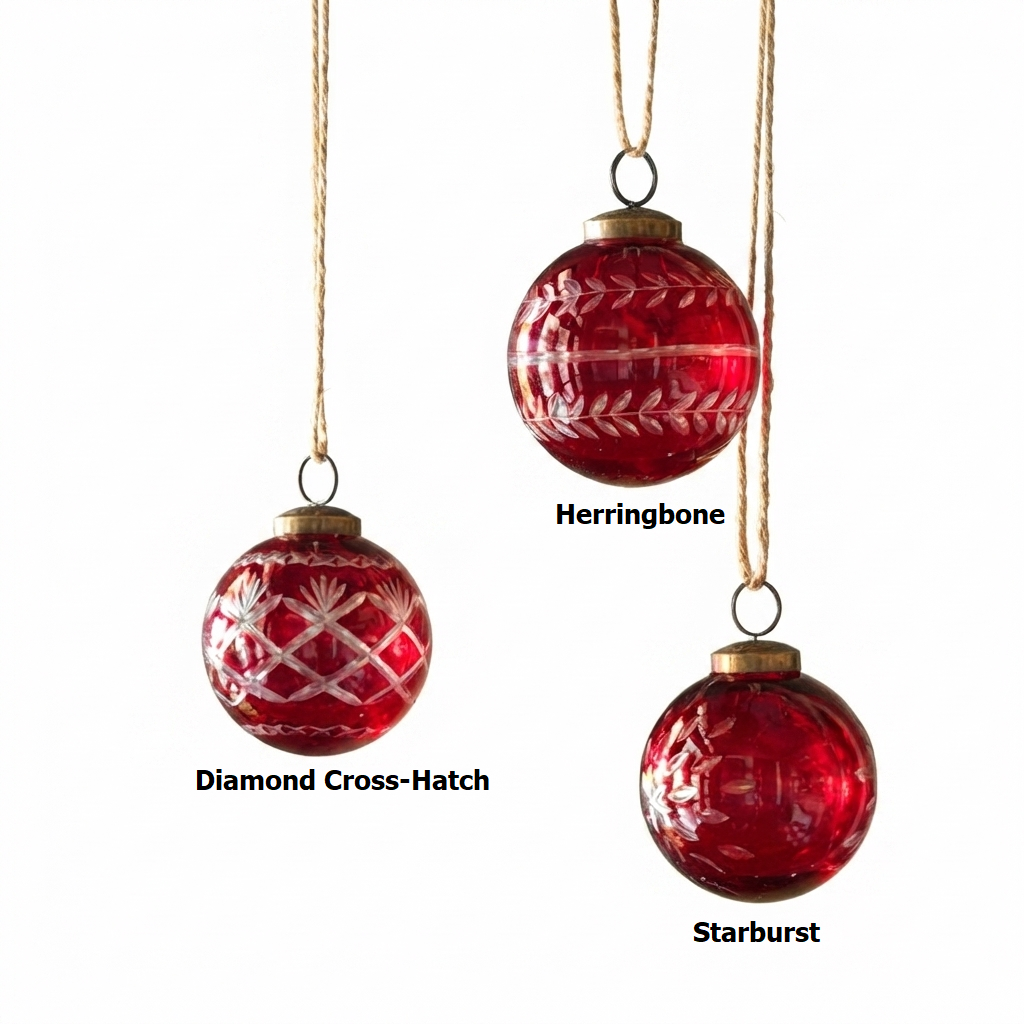 Three red etched glass 3-inch Christmas ball ornaments in Herringbone, Diamond, and Starburst styles.