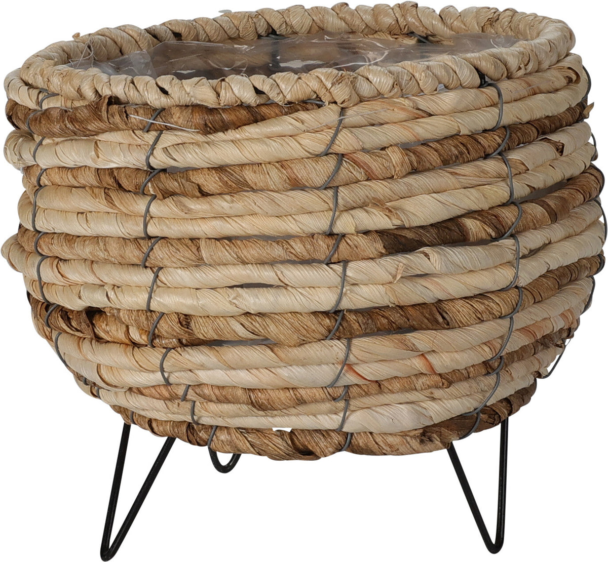 Round corn leaf basket planter with a braided rim and natural brown and tan stripes, supported by three black metal legs.
