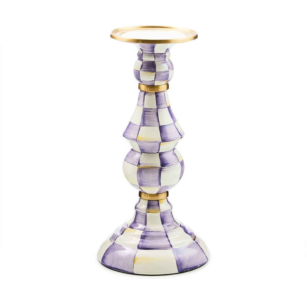 Hand-glazed steel pillar candlestick with painted check pattern, brass accents, and bronzed stainless steel rim.
