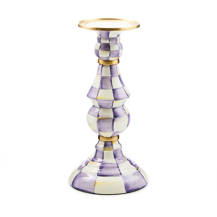 Hand-glazed steel pillar candlestick with painted check pattern, brass accents, and bronzed stainless steel rim.