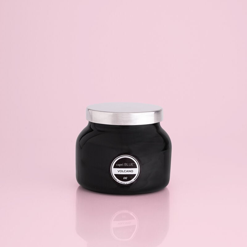 Black petite signature jar candle with a visible wick inside
