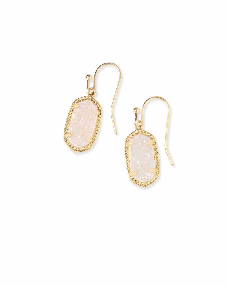 Oval mother-of-pearl drop earring with a dainty silhouette on a gold earwire.