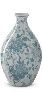 Teal and white porcelain chinoiserie vase with a floral and vine pattern.