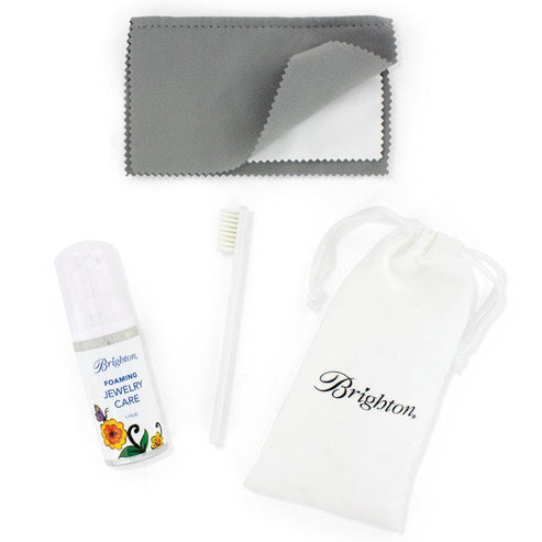 Foaming Jewelry Clean Kit with polishing cloth, brush, pouch in a biodegradable bottle.